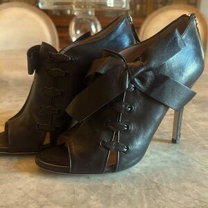 Valentino shoe  38 1/2 worn once black leather top and sole